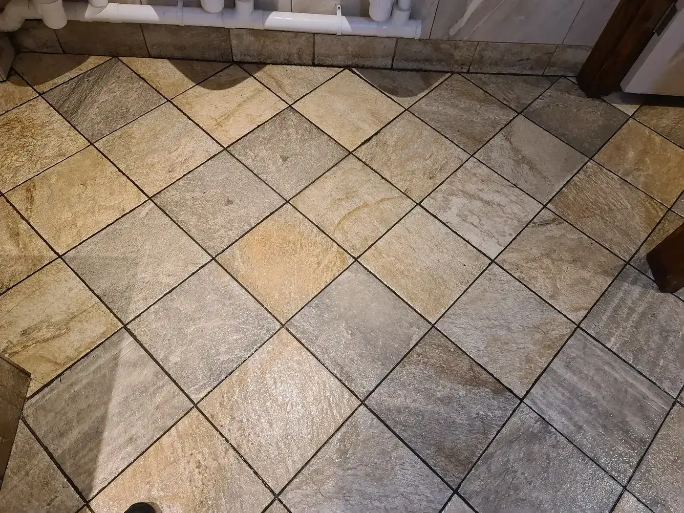 Limestone bathroom tiles in Grimsby after diamond honing and sealing